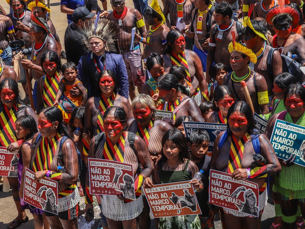 Indigenous people march for land rights in Brazil ahead of court ruling